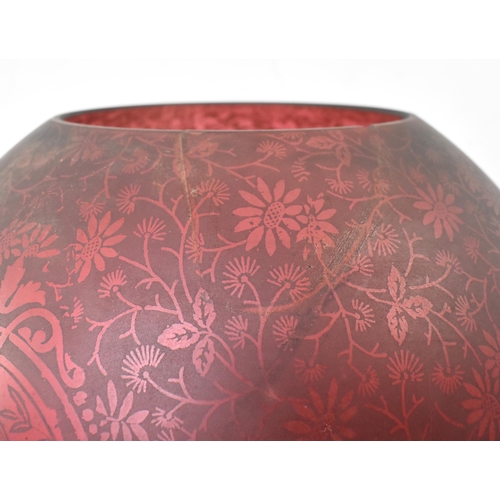 344 - A Victorian 19th century cranberry / ruby red glass acid etched bulbous oil lamp light shade. The sh... 