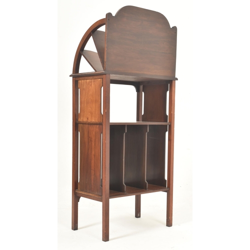 349 - An Edwardian mahogany inlaid pedestal Canterbury book / music stand rack. The stand having a shaped ... 