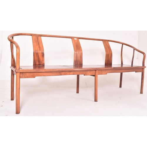 355 - A three piece suite of Chinese Huanghuali wood horseshoe three seater bench and pair of armchairs. E... 