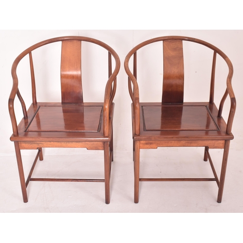 355 - A three piece suite of Chinese Huanghuali wood horseshoe three seater bench and pair of armchairs. E... 