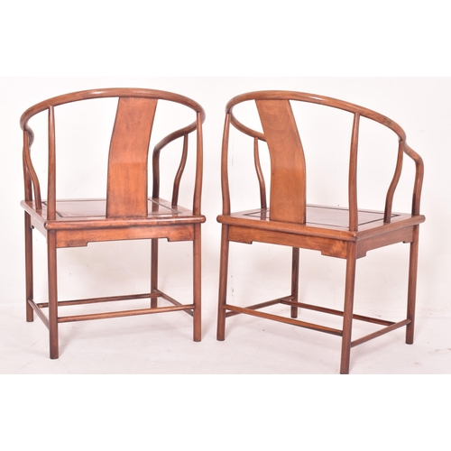 355 - A three piece suite of Chinese Huanghuali wood horseshoe three seater bench and pair of armchairs. E... 