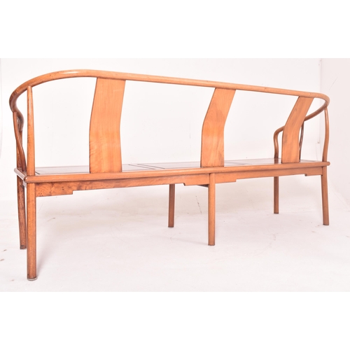 355 - A three piece suite of Chinese Huanghuali wood horseshoe three seater bench and pair of armchairs. E... 