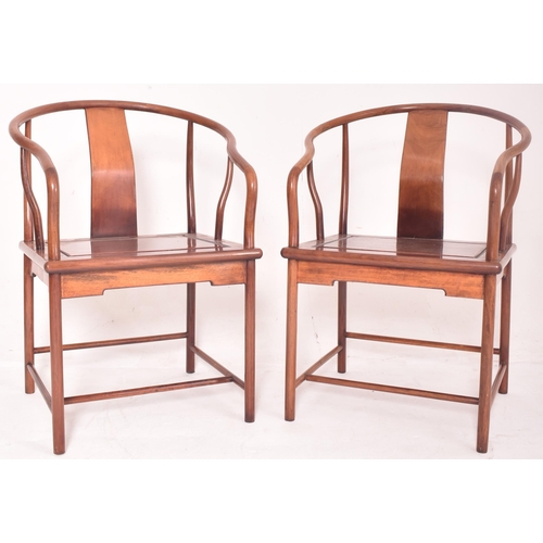 355 - A three piece suite of Chinese Huanghuali wood horseshoe three seater bench and pair of armchairs. E... 