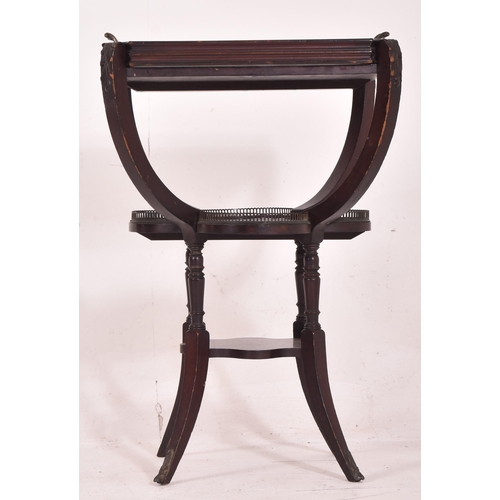 360 - A 19th century mahogany three tier serving butler's stand / occasional table. The stand having a squ... 