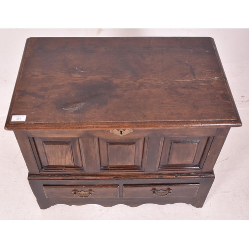 361 - A 17th century Welsh oak coffer / mule chest. The coffer having a rectangular chamfered edge top ove... 