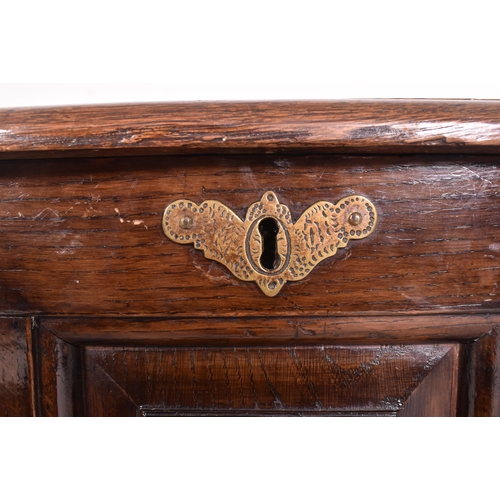 361 - A 17th century Welsh oak coffer / mule chest. The coffer having a rectangular chamfered edge top ove... 