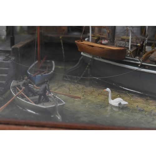 364 - A 20th century hand-built model boat diorama in mahogany & glass case. The diorama depicting a s... 