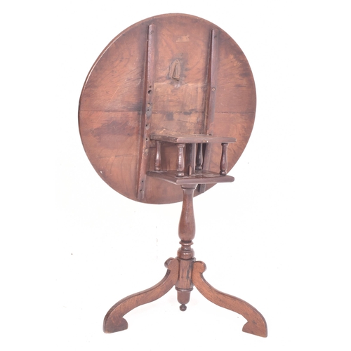 374 - A George III 18th century oak birdcage mechanism tilt top tripod loo table. The table having a circu... 