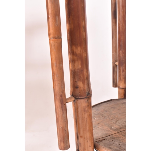 378 - A Victorian 19th century Aesthetic movement bamboo two tier torchere - jardiniere plant stand. The s... 