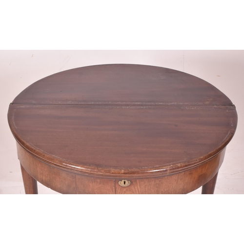 382 - A George III 18th century mahogany demi-lune folding card / game table. The table having a folding h... 