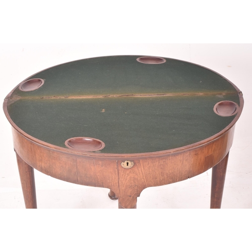 382 - A George III 18th century mahogany demi-lune folding card / game table. The table having a folding h... 