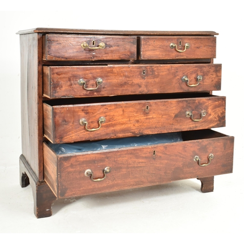 385 - A George III early 19th century mahogany straight fronted chest of drawers. The chest having a chamf... 