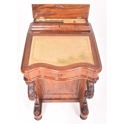 390 - A Victorian 19th century walnut davenport writing desk. The desk having a raised desk tidy space ato... 