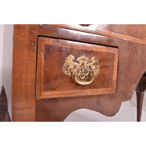 392 - A George III 19th century burr walnut crossbanded kneehole writing desk table. The desk with rectang... 