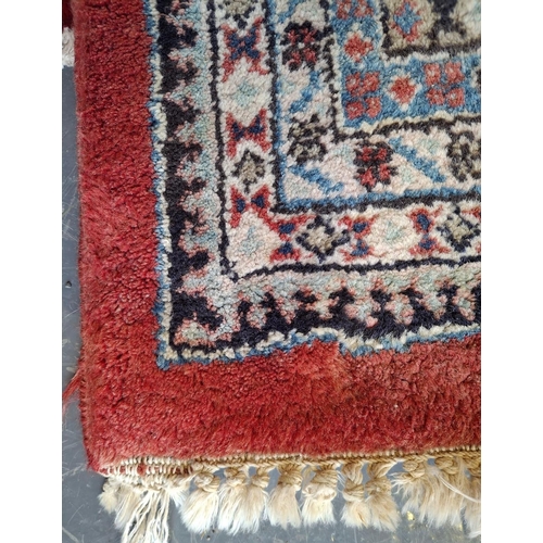 393 - A 20th century John Lewis Afghan Mahal style floor carpet rug. The rug having a central panel with s... 