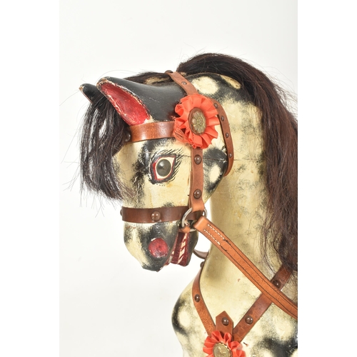 394 - Believed Harrods Knightsbridge - A Victorian late 19th century dappled grey rocking horse on stand. ... 