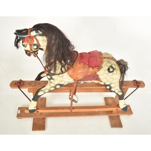 394 - Believed Harrods Knightsbridge - A Victorian late 19th century dappled grey rocking horse on stand. ... 