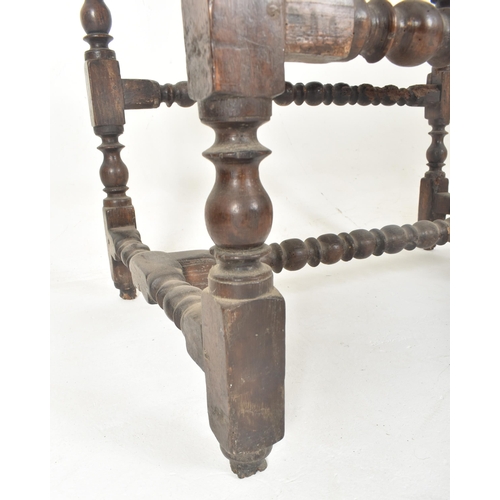 398 - A 17th century carved oak peg jointed occasional writing table. The table having a rectangular top w... 