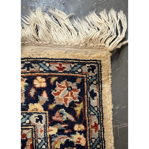 403 - A 20th century Afghan Persian floor carpet runner rug. The runner having a central medallion on blue... 