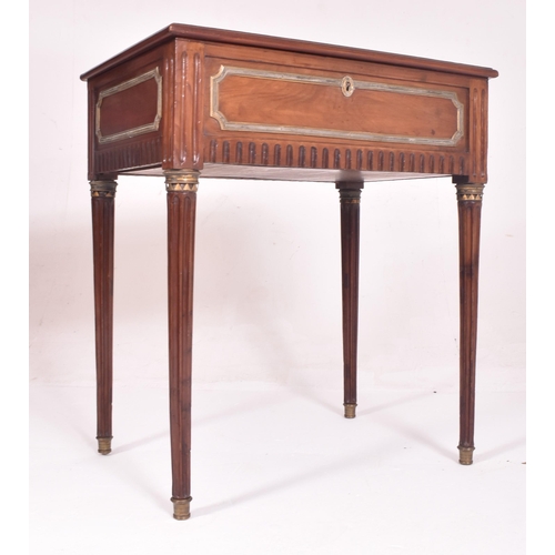 426 - A French inspired Louis XVI style mahogany & gilded bijouterie table. The table having a glazed ... 