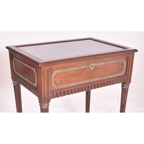 426 - A French inspired Louis XVI style mahogany & gilded bijouterie table. The table having a glazed ... 