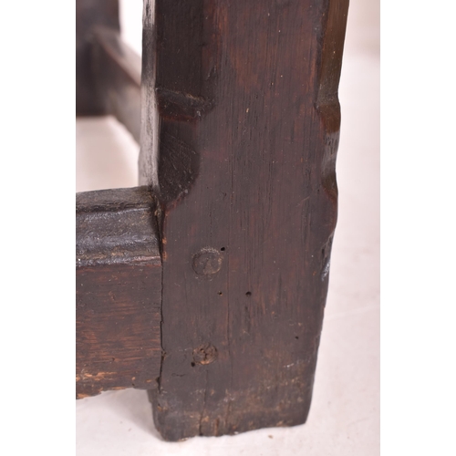 429 - An 18th century carved oak peg jointed side occasional lowboy table. The table having a rectangular ... 