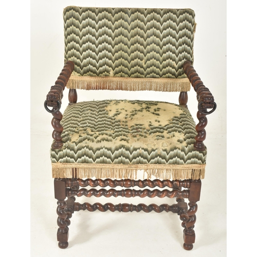 430 - A Cromwellian 19th century carved oak barley twist figurative armchair. The chair having needlepoint... 