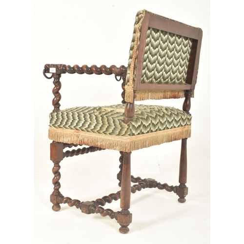 430 - A Cromwellian 19th century carved oak barley twist figurative armchair. The chair having needlepoint... 