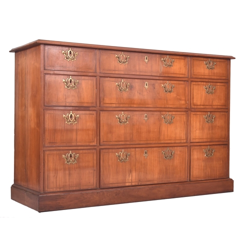 437 - A 19th century Queen Anne Revival walnut triple chest of drawers. The chest having a rectangular cha... 