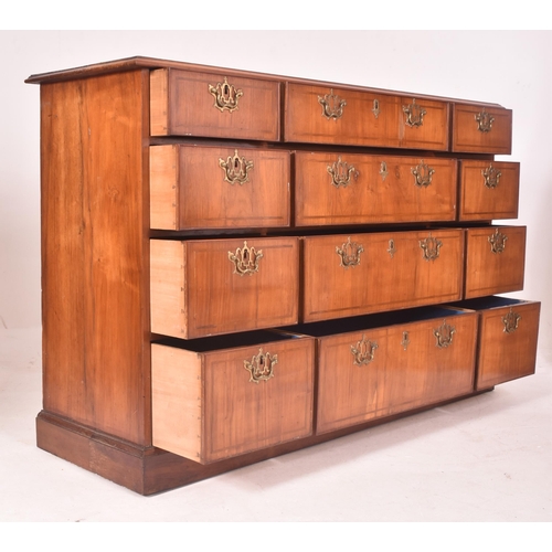 437 - A 19th century Queen Anne Revival walnut triple chest of drawers. The chest having a rectangular cha... 