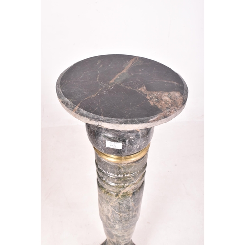 443 - An Italian inspired green marble and gilded metal turned column stand. The column having an octagona... 