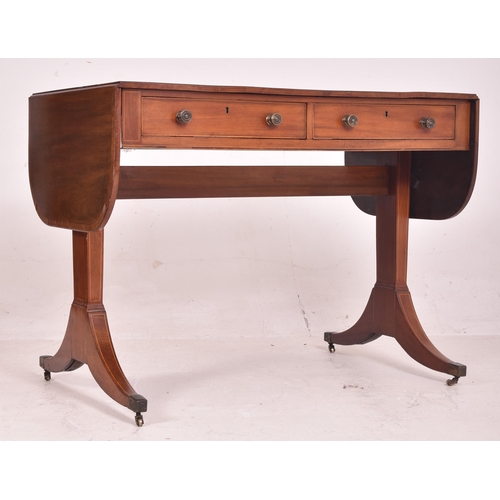 448 - A Regency early 19th century mahogany inlaid drop leaf writing table desk / sofa table. The table ha... 