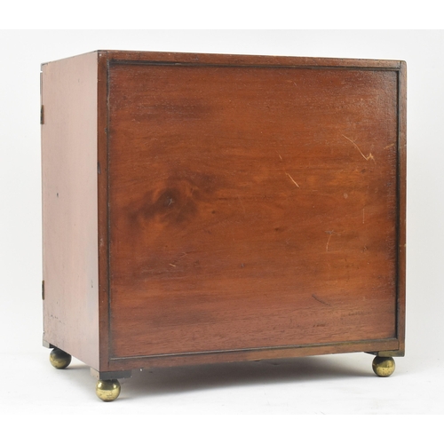 454 - A 19th century Victorian mahogany specimen table top chest / cabinet. The chest having two blind fro... 