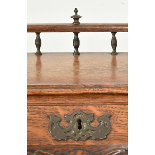 459 - Manner of Pugin - An Edwardian early 20th century carved oak bureau writing desk. The bureau with ra... 