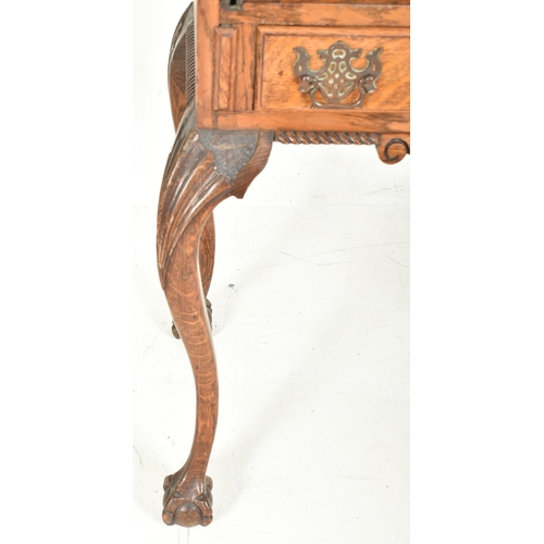 459 - Manner of Pugin - An Edwardian early 20th century carved oak bureau writing desk. The bureau with ra... 