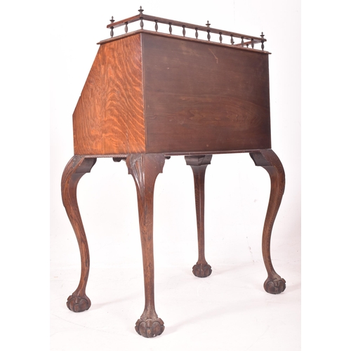 459 - Manner of Pugin - An Edwardian early 20th century carved oak bureau writing desk. The bureau with ra... 