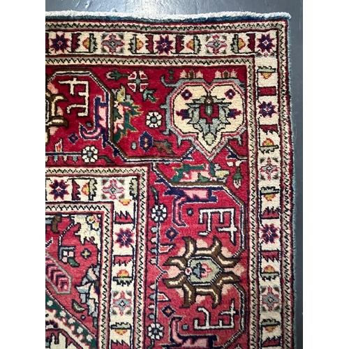 468 - A large early 20th century North West Persian Islamic Tabriz floor carpet rug. The rug having a styl... 