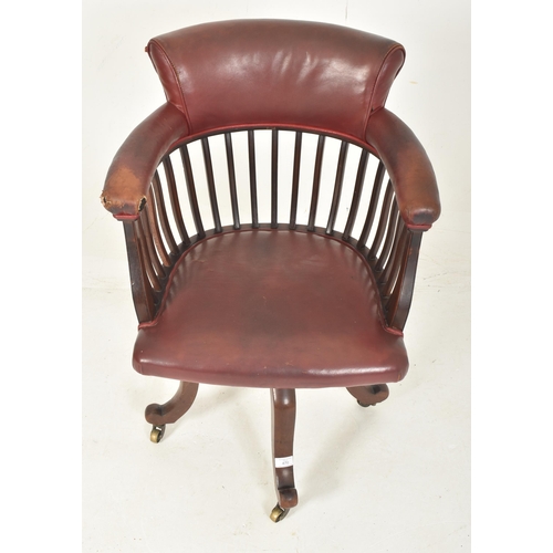 470 - A Victorian 19th century mahogany & leather spindle back captain's swivel chair. The chair havin... 