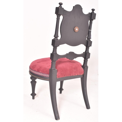 473 - An Arts & Crafts early 20th century ebonised wood & velvet upholstered low nursing chair. Th... 