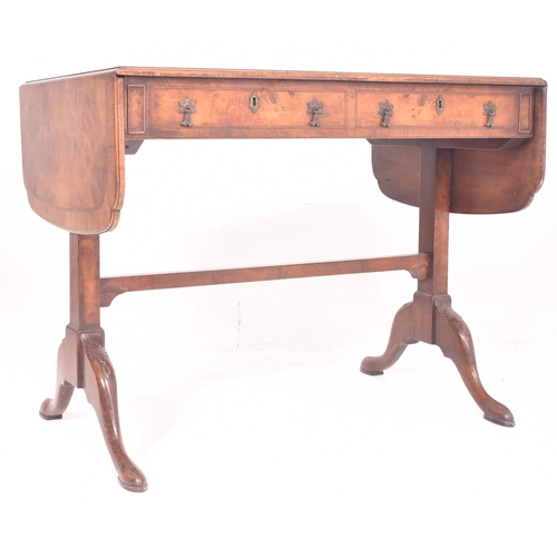 474 - A Regency early 19th century walnut drop leaf sofa writing table desk. The table having a rectangula... 