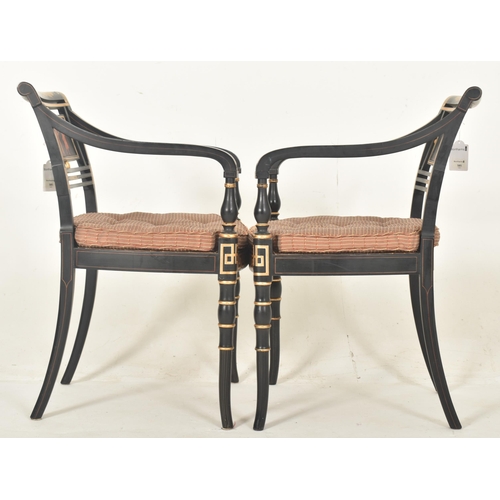 480 - A pair of Regency style ebonised & gilt painted wood rattan woven open back armchairs with Neocl... 