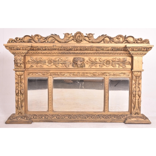 482 - A Regency Revival giltwood triptych overmantel wall mirror. The mirror having a pediment atop with p... 