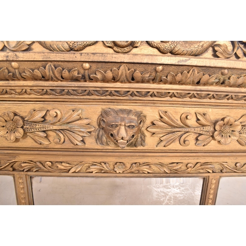 482 - A Regency Revival giltwood triptych overmantel wall mirror. The mirror having a pediment atop with p... 