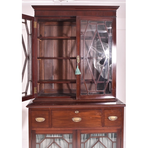 491 - A George III early 19th century mahogany & glazed library bookcase cabinet. The bookcase having ... 