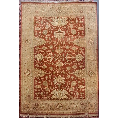 495 - An early 20th century Persian Islamic Sarouk Mer floor carpet rug. The rug having a central red grou... 