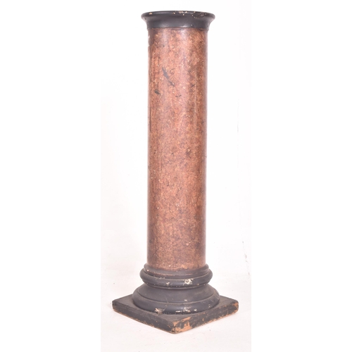 498 - A 20th century faux red marble & plaster painted column stand. The stand of circular form with b... 