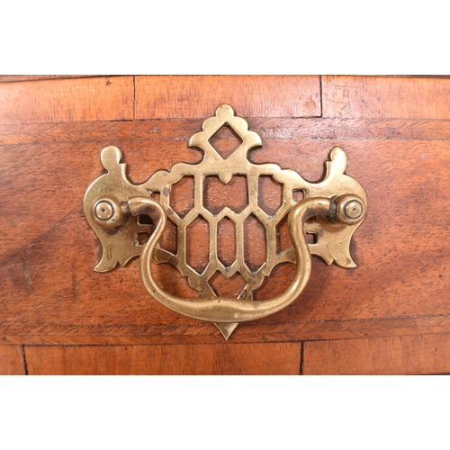 506 - An 18th century Queen Anne walnut and crossbanded, line inlaid lowboy kneehole desk. The lowboy with... 