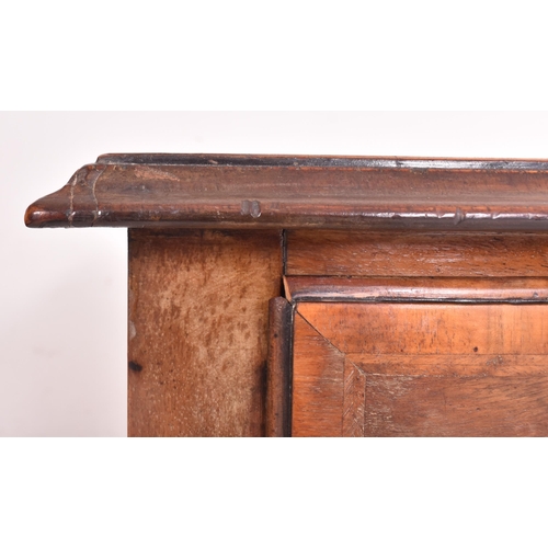 506 - An 18th century Queen Anne walnut and crossbanded, line inlaid lowboy kneehole desk. The lowboy with... 