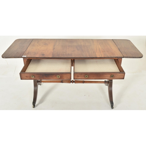 508 - A George III 19th century mahogany drop leaf writing table desk - sofa table. The table having a rec... 