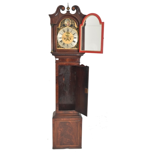 514 - A 19th century flame mahogany cased eight-day movement longcase clock. The clock having c-scrolled c... 